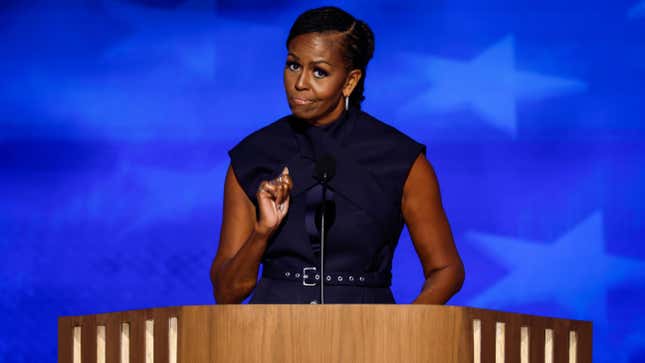 CHICAGO, ILLINOIS - AUGUST 20: Former first lady Michelle Obama speaks on stage during the second day of the Democratic National Convention at the United Center on August 20, 2024 in Chicago, Illinois. Delegates, politicians, and Democratic Party supporters are gathering in Chicago, as current Vice President Kamala Harris is named her party’s presidential nominee. The DNC takes place from August 19-22.