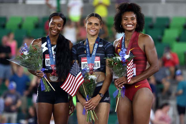  Dalilah Muhammad, Sydney McLaughlin and Anna Cockrell pose on the podium after competing in the Women’s 400 Meters Hurdles during day ten of the 2020 U.S. Olympic Track &amp; Field Team Trials at Hayward Field on June 27, 2021 in Eugene, Oregon. 