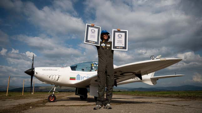 A photo of 17 year old Mack Rutherford holding his two world records. 