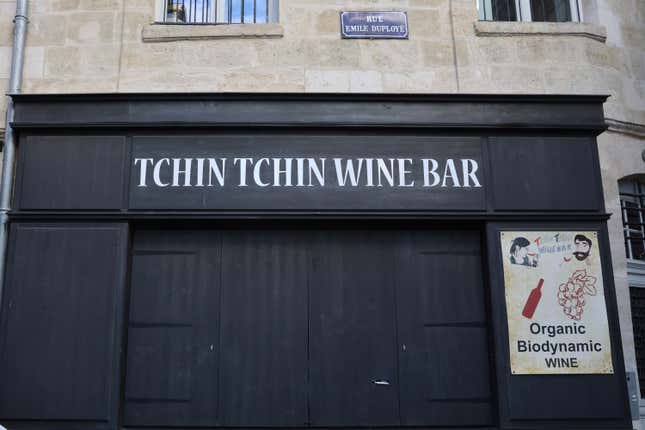 The Tchin Thin wine bar is seen in Bordeaux, southwestern France, Thursday, Sept.14, 2023. A 32-year-old woman died in France and eight other people remained hospitalized Thursday after an apparent botulism outbreak linked to homemade sardine preserves and the wine bar in Bordeaux, according to regional health officials. At least 10 people who ate in the restaurant between Sept. 4 and Sept. 10 were hospitalized, most of them in intensive care or critical condition. All had consumed sardine preserves served by the restaurant, the Tchin Tchin Wine Bar. (AP Photo/Sophie Garcia)