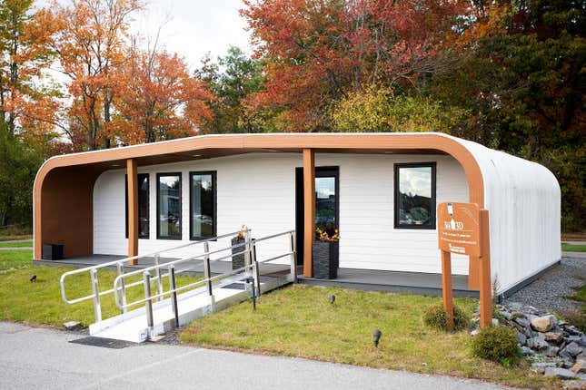 The University of Maine&#39;s first 3D printed home sits on Oct. 12, 2023, in Orono, Maine. The printer that created the house can cut construction time and labor. An even larger printer unveiled on Tuesday, April 23, 2024, may one day create entire neighborhoods. (AP Photo/Kevin Bennett)