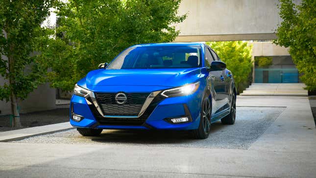 A photo of a blue Nissan Sentra sedan. 