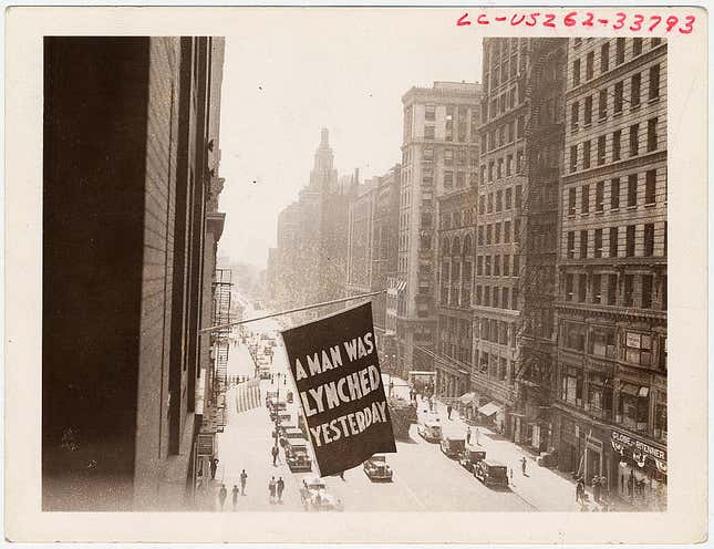 The NAACP’s flag flies on Fifth Avenue, in 1936.