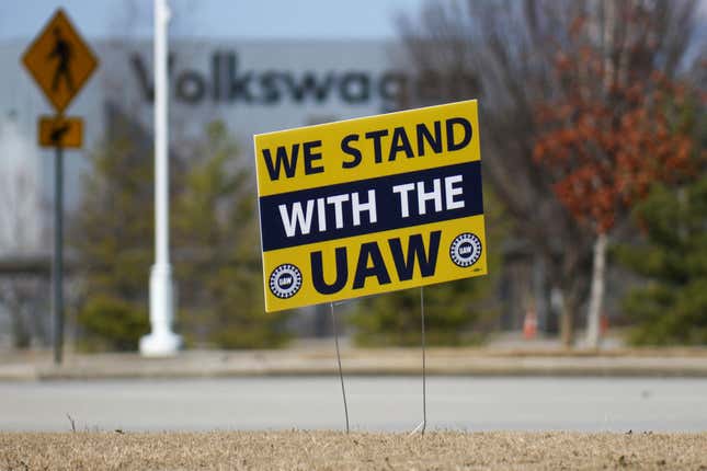 A &quot;We stand with the UAW&quot; sign is placed outside of the Volkswagen plant in Chattanooga, Tenn., on Dec. 18, 2023. Volkswagen’s factory in Chattanooga is likely to be the first test of the United Auto Workers’ effort to organize nonunion automobile plants across the nation. The union said workers at the factory filed paperwork Monday, March 18, 2024 with the National Labor Relations Board seeking a union representation election. (Olivia Ross/Chattanooga Times Free Press via AP, file)