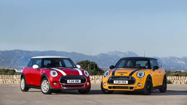 A red 2014 Mini Cooper next to a yellow 2014 Mini Cooper S