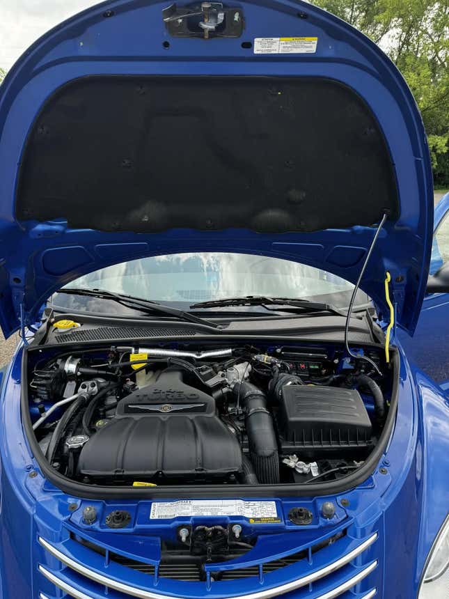 An underhood of the immaculate PT cruiser's turbo 2.4 liter engine