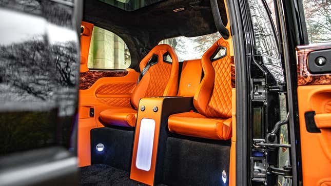 A photo of the orange interior in a Kahn taxi. 