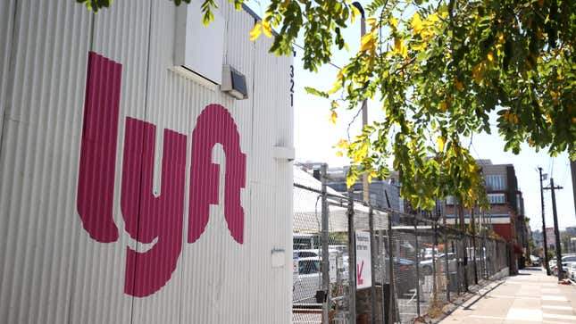 A sign is posted in front of a Lyft driver center on August 12, 2020 in San Francisco, California. Lyft reported a 61 percent drop in second quarter revenues with earnings of $339.3 million compared to $867.3 million one year ago.