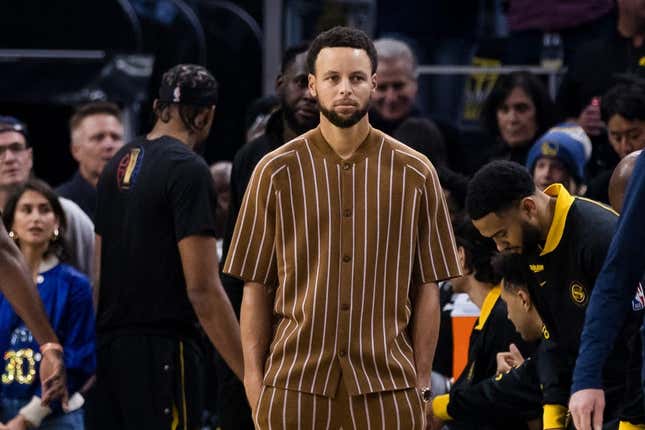 Nov 14, 2023; San Francisco, California, USA; Golden State Warriors guard Stephen Curry (30) watches the game against the Minnesota Timberwolvesx during the first half at Chase Center.