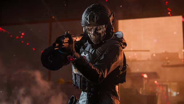 A character in a skull mask holds up a gun to the camera.