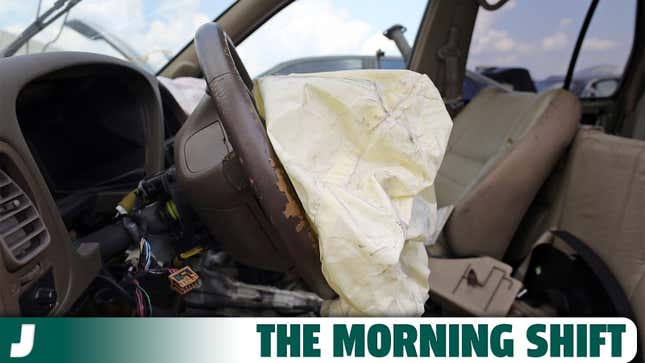 A photo of an airbag deployed in a car after an accident.