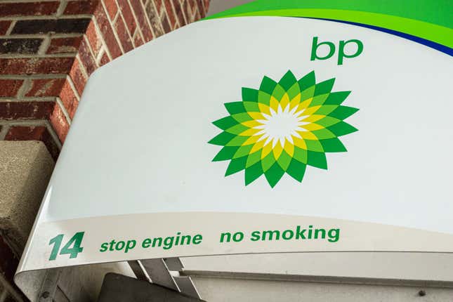 Charlotte, North Carolina, BP gas station, logo and stop engine, no smoking sign. 