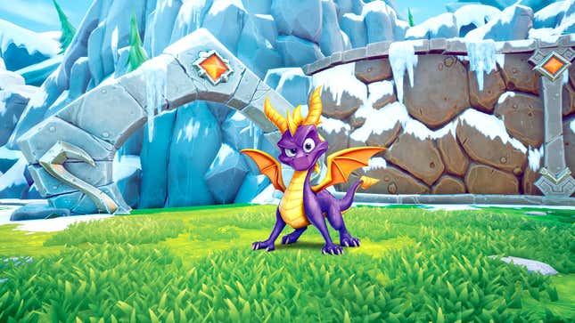 Spyro the Dragon poses in a grass field against a icy mountain in promotional artwork for 2018's Spyro Reignited Trilogy by developer Toys for Bob.