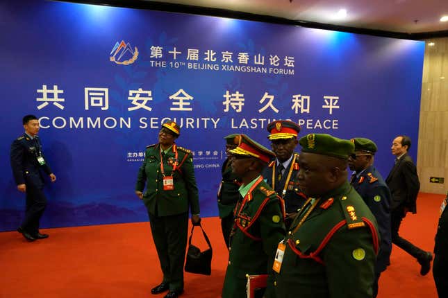 Foreign military delegates arrive for the 10th Beijing Xiangshan Forum in Beijing, Tuesday, Oct. 31, 2023. Singapore&#39;s defense minister Ng Eng Hen called on China, as a dominant power in Asia, to take the lead in reducing tensions by being a benevolent one, warning that military conflict like the wars in Ukraine and Gaza would be devastating to the region&#39;s future. (AP Photo/Ng Han Guan)