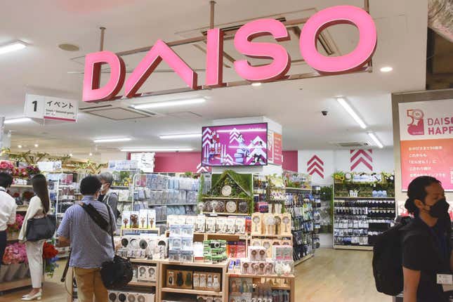 Shoppers visit a Daiso shop as the shop opened to the media in Tokyo, on April 13, 2022. Hirotake Yano, who founded the retail chain Daiso known for its 100-yen shops, Japan’s equivalent of the dollar store, has died. He was 80.(Kyodo News via AP)