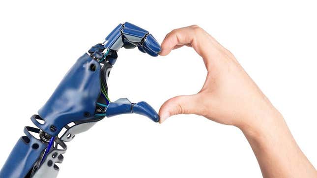 A robot and a human making a heart shape with their hands