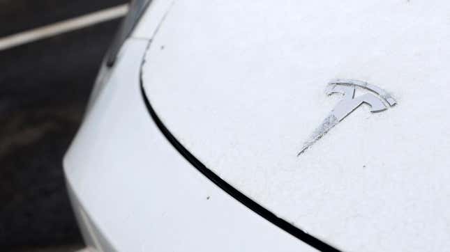 Frost on the badge of a Tesla Model Y electric vehicle in a lot at the Tesla Inc. Gigafactory in Gruenheide, Germany, on Saturday, Jan. 21, 2023