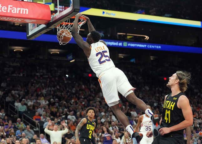 Oct 28, 2023; Phoenix, Arizona, USA; Phoenix Suns forward Nassir Little (25) dunks against the Utah Jazz during the second half at Footprint Center.