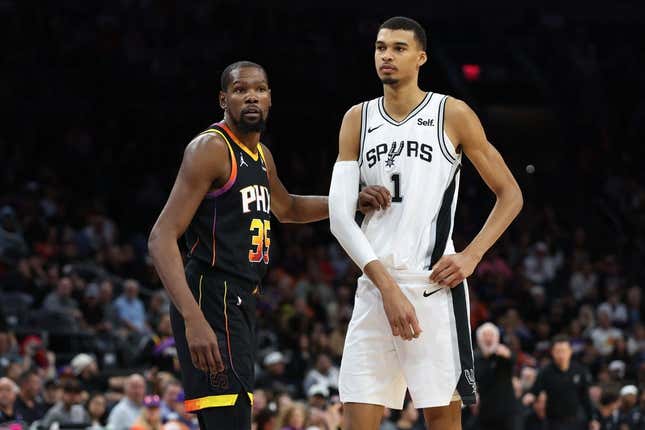 Oct 31, 2023; Phoenix, Arizona, USA; Phoenix Suns forward Kevin Durant #35 guards San Antonio Spurs center Victor Wembanyama #1 during the second half at Footprint Center.