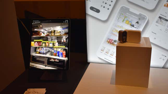 A Smarter fridge camera next to an ipad with several fridge items labeled.