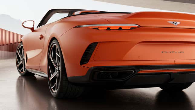 Rear end of an orange Bentley Batur Convertible