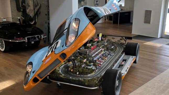 Image for article titled Someone Paid Over $200K for This Slot Car Track Hidden in a Porsche 917 Body