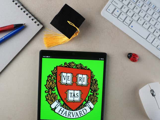 Harvard University logo on a tablet. 