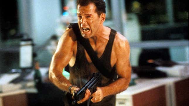 Bruce Willis runs with a gun in the movie Die Hard.