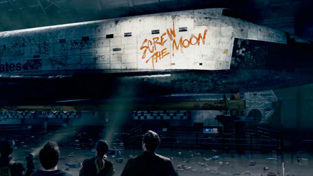 A group of people shine flashlights on an abandoned space shuttler which has "Screw the Moon" painted on it.
