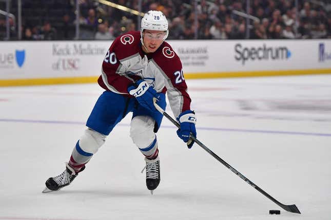 Oct 11, 2023; Los Angeles, California, USA; Colorado Avalanche center Ross Colton (20) moves the puck against the Los Angeles Kings during the first period at Crypto.com Arena.