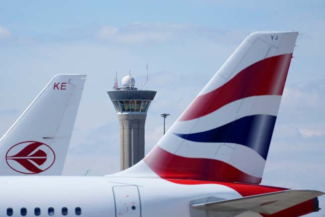 FILE - The air traffic control tower of Charles de Gaulle airport is pictured in Roissy-en-France, north of Paris, Tuesday, April 23, 2024 in Paris. Air passengers traveling to and from Paris experienced significant disruptions on Thursday, despite a canceled strike by air traffic controllers after last-minute negotiations. Although the strike was averted, the prior adjustments made in anticipation caused a substantial reduction in flight operations. (AP Photo/Thibault Camus, File)