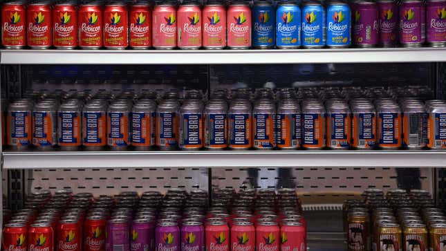 A fridge full of drinks cans