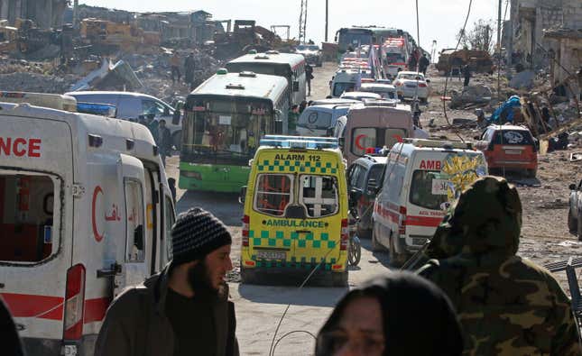 Evacuation ambulances and buses in a rebel-held sector of eastern Aleppo. (Reuters/Abdalrhman Ismail)