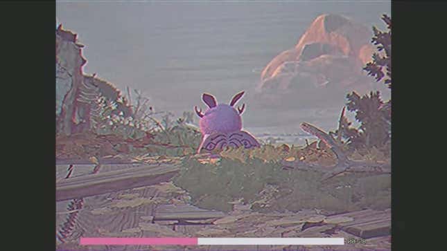 Moth Girl sits with her back turned to the camera.