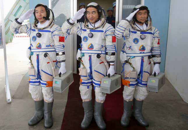 The mission sent Chinese astronauts Jing Haipeng (L), Zhai Zhigang (C) and Liu Boming into space in 2008, and included the country’s first ever spacewalk.