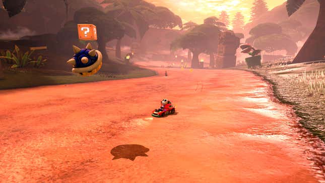 A Blue Shell flies toward Shyguy.