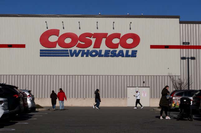 People walk through the parking lot at a Costco on Feb. 1, 2025, in Bayonne, New Jersey. 