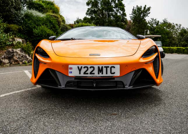 Front end of an orange McLaren Artura Spider
