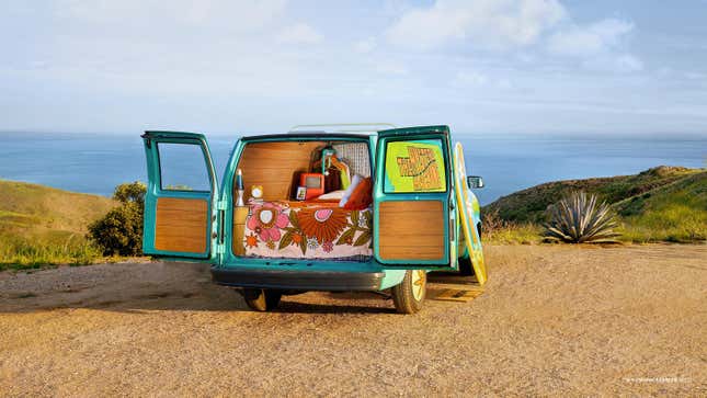 The Mystery Machine is shown with the truck open, which reveals a bed and TV.