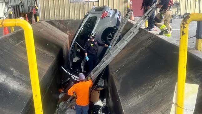 Image for article titled Massachusetts Woman Drives Car Into Trash Compactor