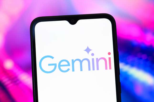 A photo illustration of the Google Gemini logo on a smartphone screen in front of blue and fuschia lights