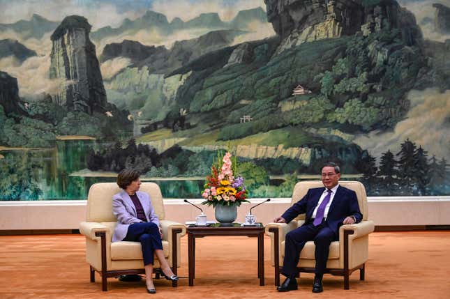 Chinese Premier Li Qiang, right, and French Foreign Minister Catherine Colonna hold a talk at the Great Hall of the People in Beijing Friday, Nov. 24, 2023. (Jade Gao/Pool Photo via AP)