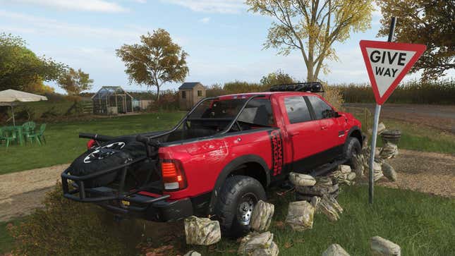 The current state of Forza Horizon 4, with a pick-up truck driven through a wall.