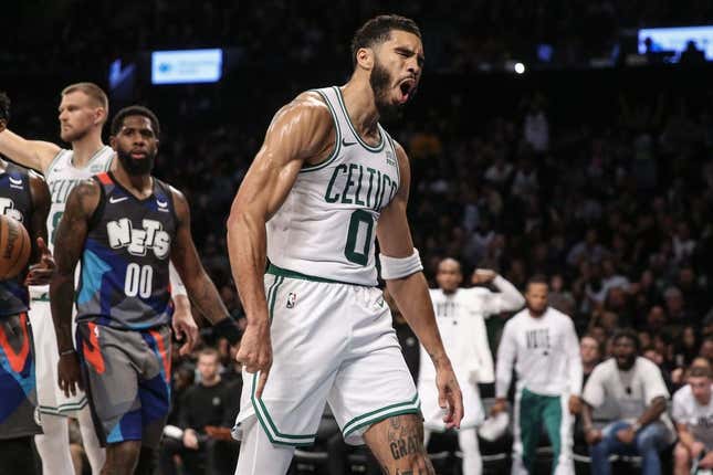 Nov 4, 2023; Brooklyn, New York, USA;  Boston Celtics forward Jayson Tatum (0) reacts after being fouled on a made basket in the second quarter against the Brooklyn Nets at Barclays Center.