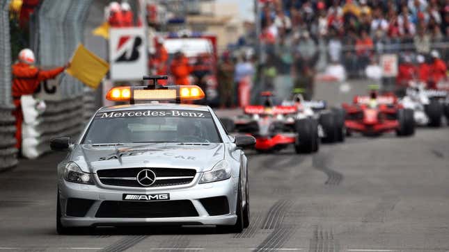The Mercedes-Benz safety car leads the F1 pack. 