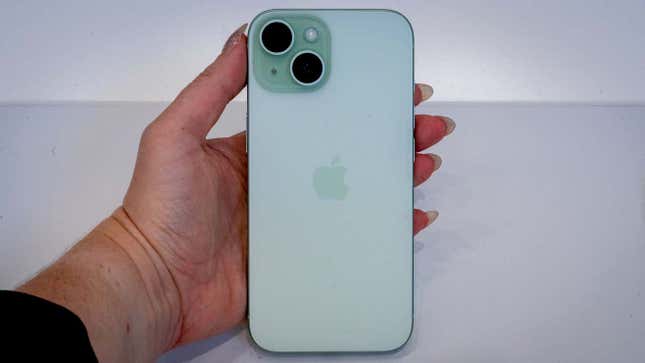 The 6.1-inch iPhone 15 in green.