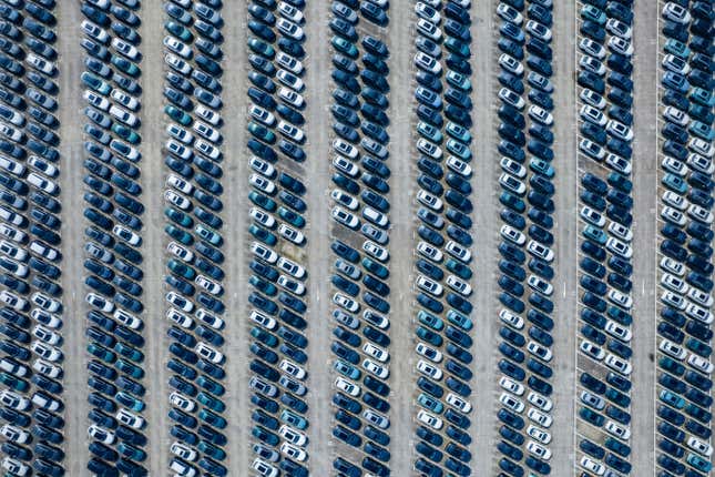 An aerial view of new passenger cars are seen at a logistics center of Changan Auto in southwestern China&#39;s Chongqing Municipality on Oct. 15, 2023. Sales of passenger cars rose 10.2% in October over a year earlier, an industry association said Wednesday, Nov. 8, as makers ramped up promotions and customers opted for electric and hybrid vehicles. (Chinatopix Via AP)