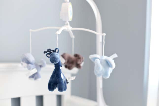 A baby mobile above a crib