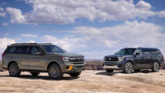 A ford expedition tremor parked on a rock next to an Expedition Max