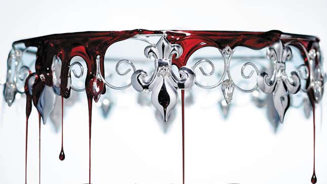 A blood-covered crown, inverted as it drips red, on the cover of Victoria Aveyard's 'Red Queen'.